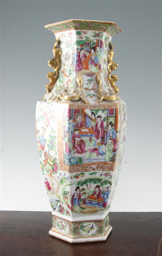 A Chinese Canton-decorated famille rose hexagonal baluster vase, mid 19th century, 44cm, slight restorations